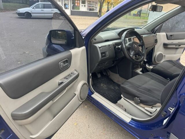 Синий Ниссан ИксТрейл, объемом двигателя 2.2 л и пробегом 300 тыс. км за 2650 $, фото 7 на Automoto.ua