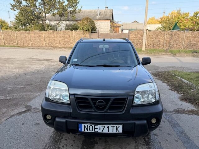 Синий Ниссан ИксТрейл, объемом двигателя 2 л и пробегом 400 тыс. км за 2850 $, фото 1 на Automoto.ua