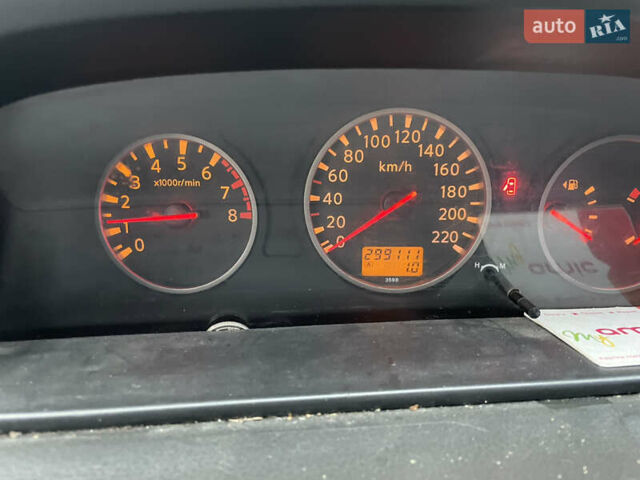 Синий Ниссан ИксТрейл, объемом двигателя 2.4 л и пробегом 299 тыс. км за 4600 $, фото 5 на Automoto.ua