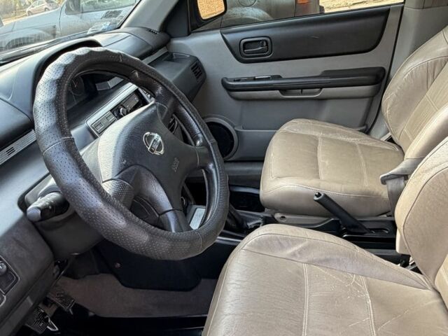 Синий Ниссан ИксТрейл, объемом двигателя 2 л и пробегом 400 тыс. км за 2850 $, фото 10 на Automoto.ua