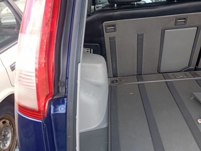 Синий Ниссан ИксТрейл, объемом двигателя 2.5 л и пробегом 200 тыс. км за 2189 $, фото 2 на Automoto.ua