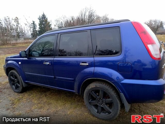 Синий Ниссан ИксТрейл, объемом двигателя 25 л и пробегом 270 тыс. км за 7779 $, фото 9 на Automoto.ua