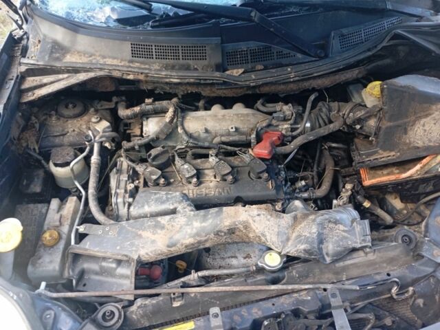 Синий Ниссан ИксТрейл, объемом двигателя 2.5 л и пробегом 200 тыс. км за 2189 $, фото 6 на Automoto.ua