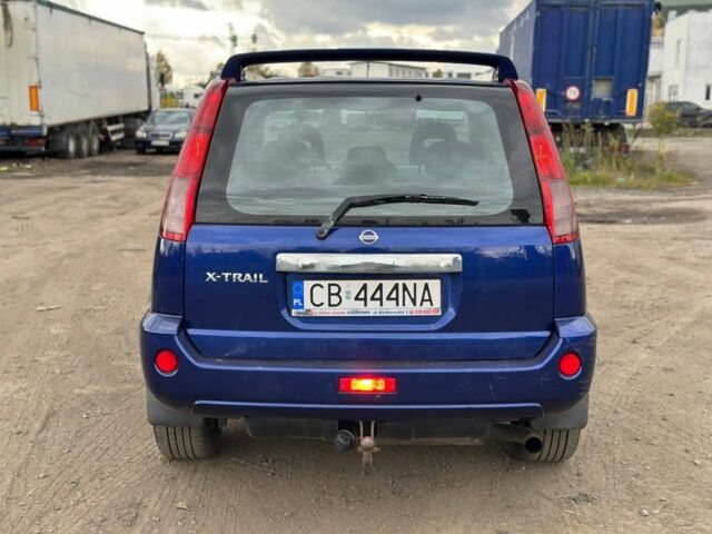 Синий Ниссан ИксТрейл, объемом двигателя 2.2 л и пробегом 280 тыс. км за 3699 $, фото 4 на Automoto.ua