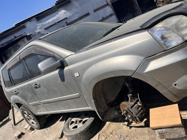 Синий Ниссан ИксТрейл, объемом двигателя 2.5 л и пробегом 165 тыс. км за 3000 $, фото 2 на Automoto.ua