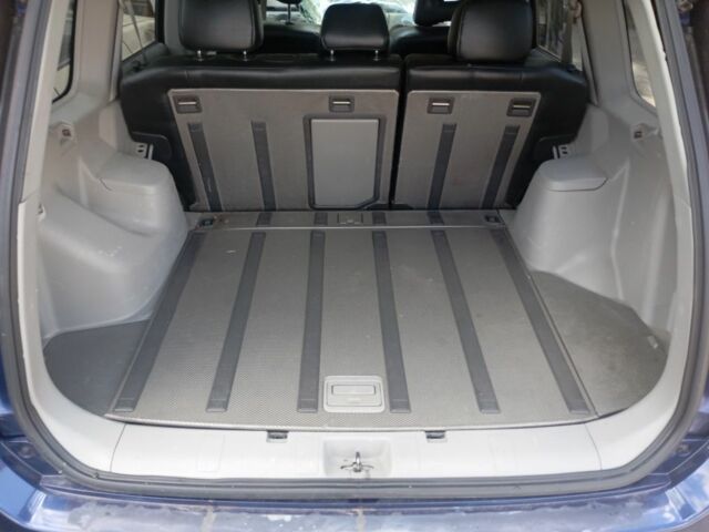 Синий Ниссан ИксТрейл, объемом двигателя 2.5 л и пробегом 200 тыс. км за 2189 $, фото 1 на Automoto.ua