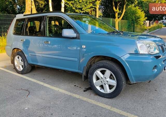 Синій Ніссан ІксТрейл, об'ємом двигуна 2 л та пробігом 312 тис. км за 7200 $, фото 7 на Automoto.ua