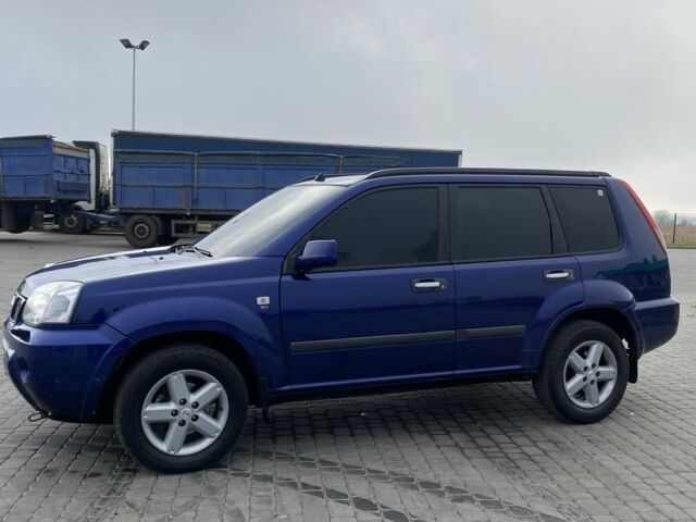 Синий Ниссан ИксТрейл, объемом двигателя 2.2 л и пробегом 200 тыс. км за 3850 $, фото 2 на Automoto.ua