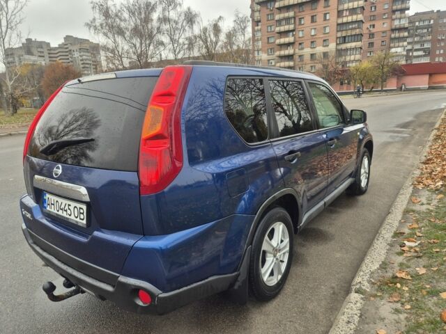 Синий Ниссан ИксТрейл, объемом двигателя 2 л и пробегом 204 тыс. км за 10000 $, фото 3 на Automoto.ua