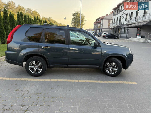 Синий Ниссан ИксТрейл, объемом двигателя 2 л и пробегом 238 тыс. км за 13550 $, фото 7 на Automoto.ua