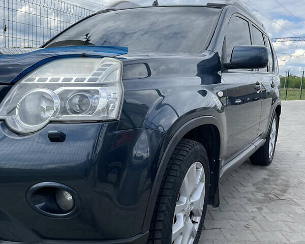 Синій Ніссан ІксТрейл, об'ємом двигуна 2 л та пробігом 186 тис. км за 11499 $, фото 9 на Automoto.ua