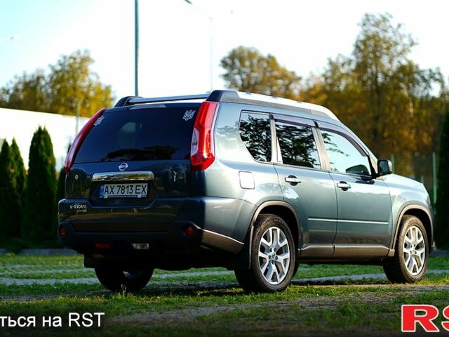 Синий Ниссан ИксТрейл, объемом двигателя 2 л и пробегом 369 тыс. км за 9500 $, фото 9 на Automoto.ua