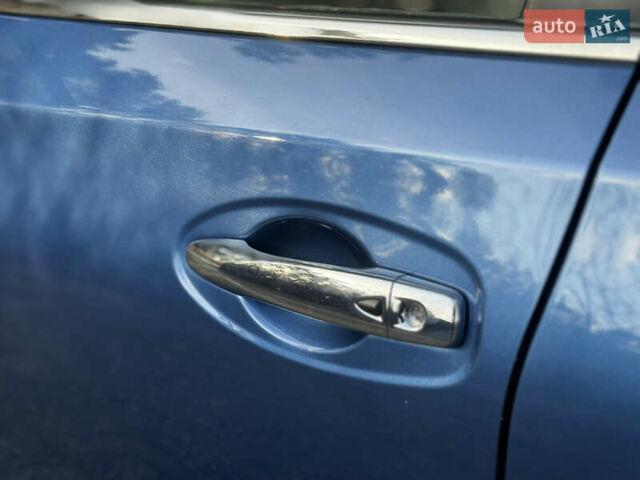 Синий Ниссан ИксТрейл, объемом двигателя 2 л и пробегом 87 тыс. км за 18900 $, фото 3 на Automoto.ua