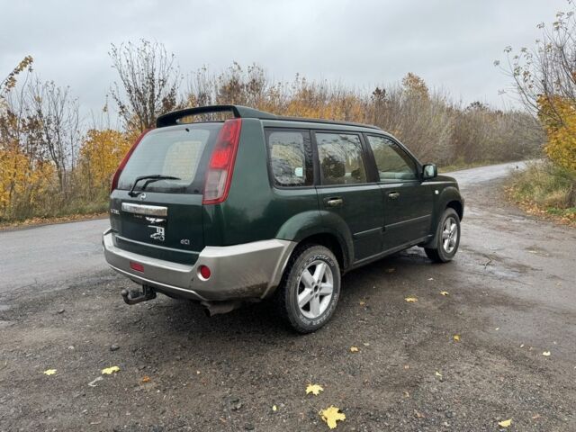 Зеленый Ниссан ИксТрейл, объемом двигателя 2.2 л и пробегом 270 тыс. км за 3400 $, фото 5 на Automoto.ua