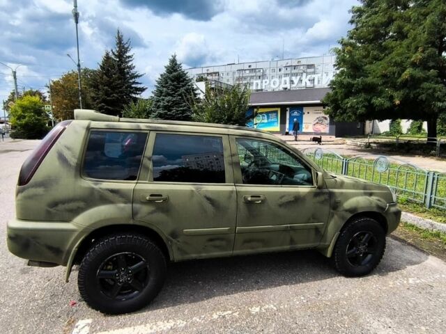 Зеленый Ниссан ИксТрейл, объемом двигателя 2.2 л и пробегом 399 тыс. км за 4000 $, фото 1 на Automoto.ua