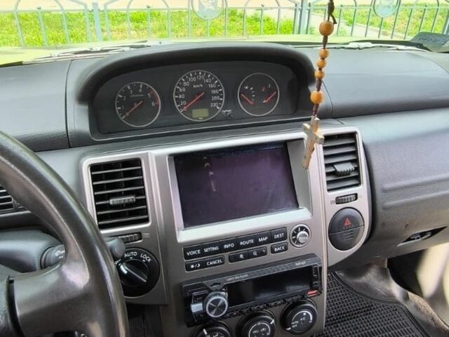 Зеленый Ниссан ИксТрейл, объемом двигателя 2.2 л и пробегом 399 тыс. км за 4000 $, фото 11 на Automoto.ua