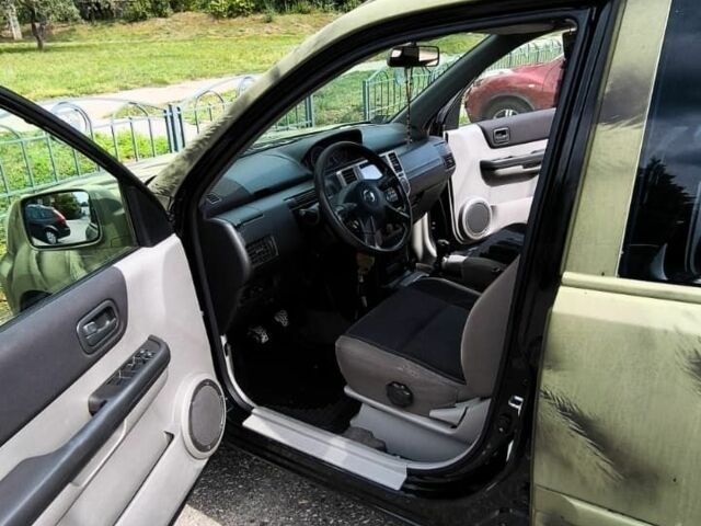 Зеленый Ниссан ИксТрейл, объемом двигателя 2.2 л и пробегом 399 тыс. км за 4000 $, фото 10 на Automoto.ua