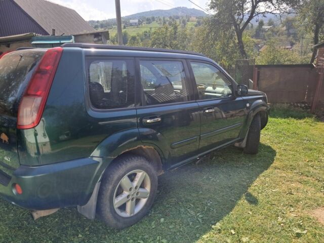 Зеленый Ниссан ИксТрейл, объемом двигателя 2.2 л и пробегом 260 тыс. км за 3500 $, фото 6 на Automoto.ua