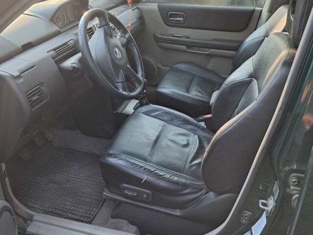 Зеленый Ниссан ИксТрейл, объемом двигателя 2.2 л и пробегом 260 тыс. км за 3500 $, фото 7 на Automoto.ua