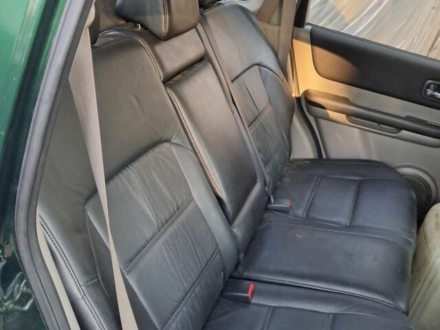 Зеленый Ниссан ИксТрейл, объемом двигателя 2.2 л и пробегом 260 тыс. км за 3500 $, фото 5 на Automoto.ua