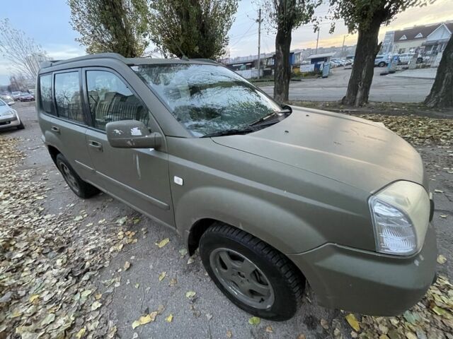 Зеленый Ниссан ИксТрейл, объемом двигателя 2.2 л и пробегом 250 тыс. км за 3800 $, фото 4 на Automoto.ua