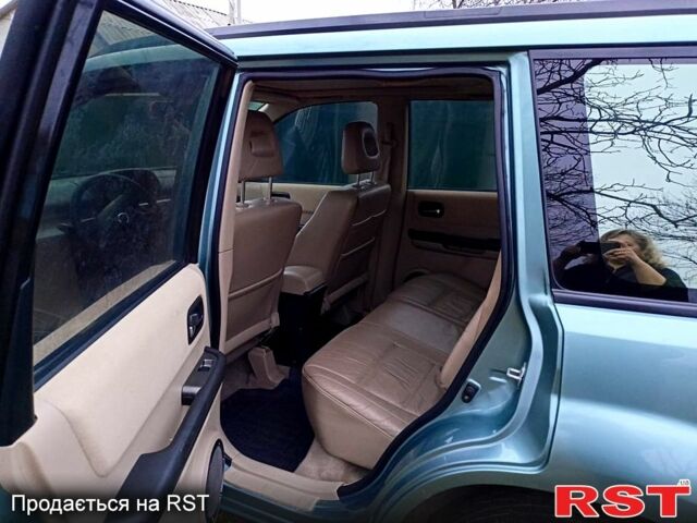 Зеленый Ниссан ИксТрейл, объемом двигателя 2 л и пробегом 160 тыс. км за 5600 $, фото 3 на Automoto.ua