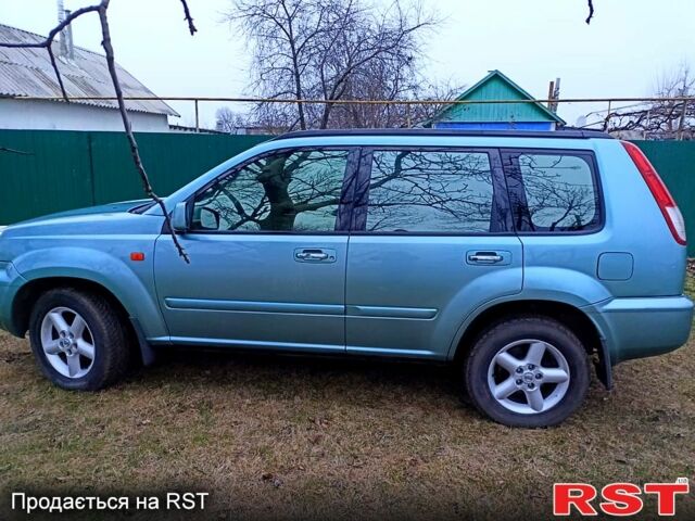 Зеленый Ниссан ИксТрейл, объемом двигателя 2 л и пробегом 160 тыс. км за 5600 $, фото 1 на Automoto.ua