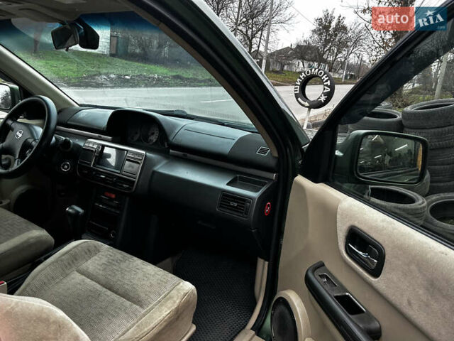 Зеленый Ниссан ИксТрейл, объемом двигателя 2 л и пробегом 308 тыс. км за 5700 $, фото 13 на Automoto.ua