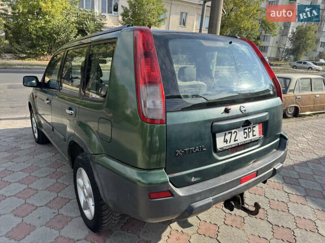 Зелений Ніссан ІксТрейл, об'ємом двигуна 2.2 л та пробігом 300 тис. км за 3399 $, фото 5 на Automoto.ua