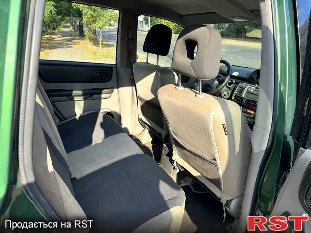 Зеленый Ниссан ИксТрейл, объемом двигателя 2.2 л и пробегом 300 тыс. км за 3199 $, фото 10 на Automoto.ua