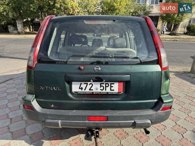 Зелений Ніссан ІксТрейл, об'ємом двигуна 2.2 л та пробігом 300 тис. км за 3399 $, фото 4 на Automoto.ua