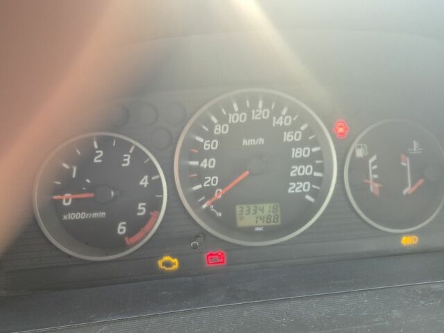 Зеленый Ниссан ИксТрейл, объемом двигателя 2 л и пробегом 334 тыс. км за 3974 $, фото 3 на Automoto.ua