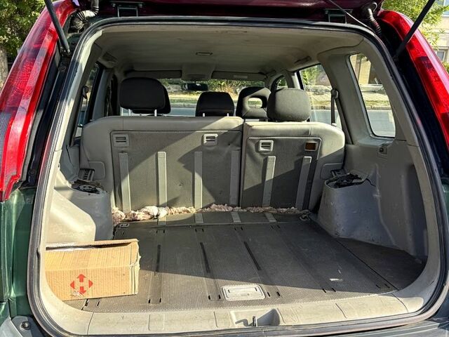 Зеленый Ниссан ИксТрейл, объемом двигателя 2.2 л и пробегом 300 тыс. км за 3199 $, фото 9 на Automoto.ua