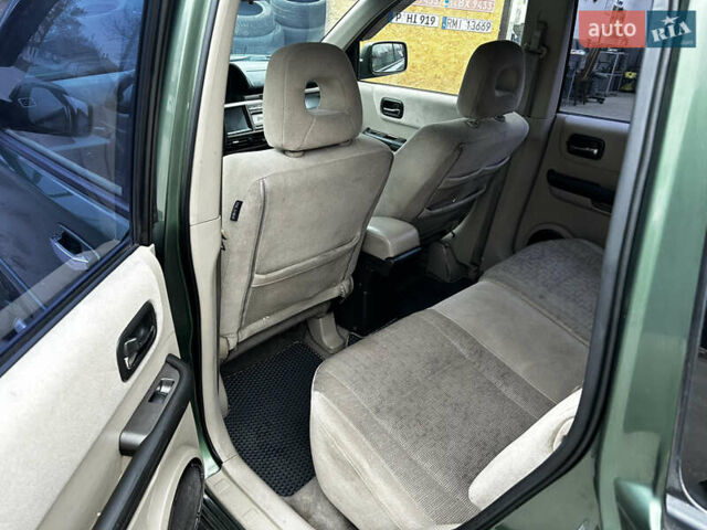 Зеленый Ниссан ИксТрейл, объемом двигателя 2 л и пробегом 308 тыс. км за 5700 $, фото 11 на Automoto.ua