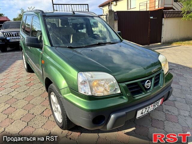 Зеленый Ниссан ИксТрейл, объемом двигателя 2.2 л и пробегом 300 тыс. км за 3199 $, фото 2 на Automoto.ua