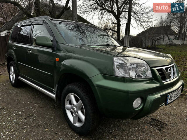 Зеленый Ниссан ИксТрейл, объемом двигателя 2 л и пробегом 308 тыс. км за 5700 $, фото 1 на Automoto.ua