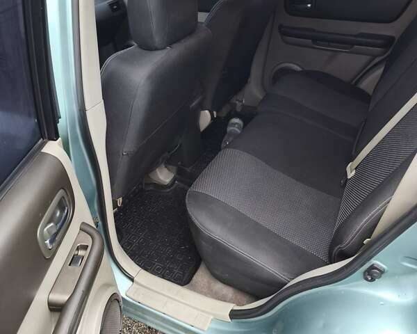 Зелений Ніссан ІксТрейл, об'ємом двигуна 2.18 л та пробігом 372 тис. км за 6100 $, фото 9 на Automoto.ua