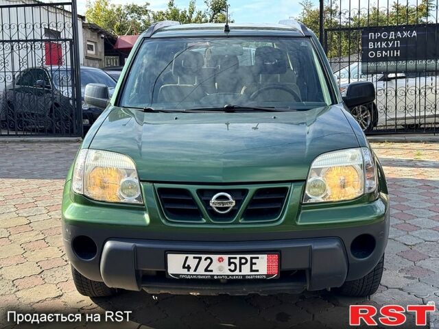 Зеленый Ниссан ИксТрейл, объемом двигателя 2.2 л и пробегом 300 тыс. км за 3199 $, фото 1 на Automoto.ua