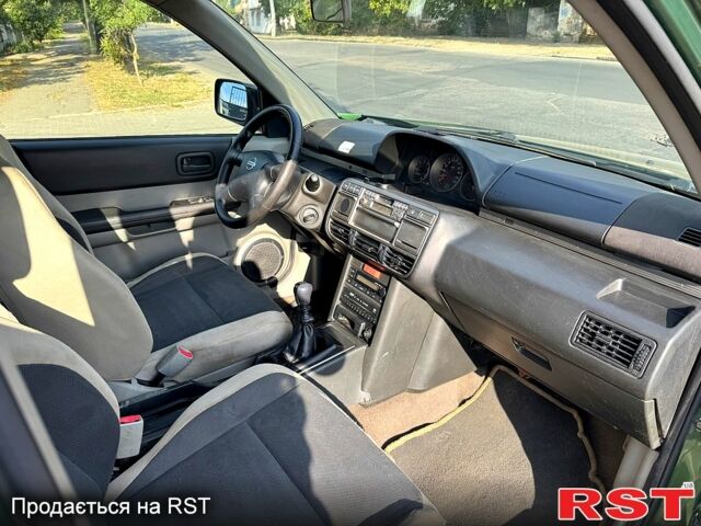 Зеленый Ниссан ИксТрейл, объемом двигателя 2.2 л и пробегом 300 тыс. км за 3199 $, фото 12 на Automoto.ua