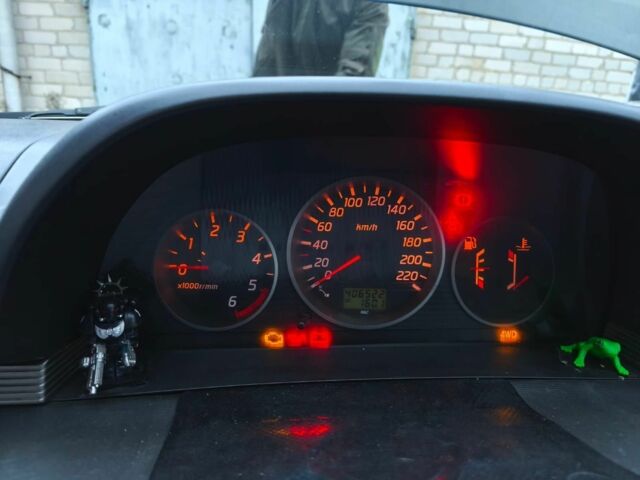 Зеленый Ниссан ИксТрейл, объемом двигателя 2.2 л и пробегом 406 тыс. км за 2135 $, фото 3 на Automoto.ua