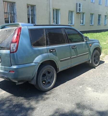 Зелений Ніссан ІксТрейл, об'ємом двигуна 2 л та пробігом 315 тис. км за 5500 $, фото 2 на Automoto.ua