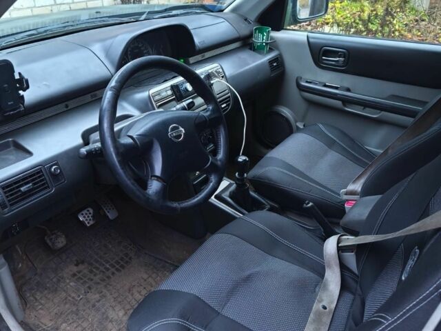 Зеленый Ниссан ИксТрейл, объемом двигателя 2.2 л и пробегом 406 тыс. км за 2135 $, фото 4 на Automoto.ua