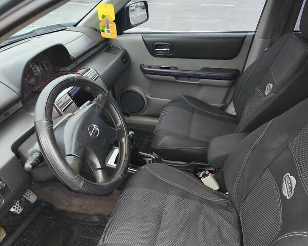 Зелений Ніссан ІксТрейл, об'ємом двигуна 2.18 л та пробігом 372 тис. км за 6100 $, фото 8 на Automoto.ua