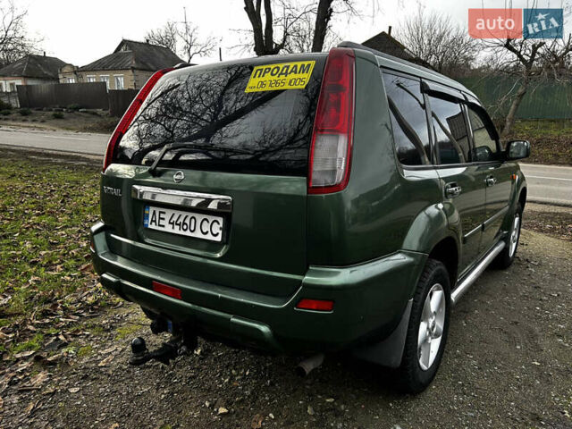 Зеленый Ниссан ИксТрейл, объемом двигателя 2 л и пробегом 308 тыс. км за 5700 $, фото 3 на Automoto.ua