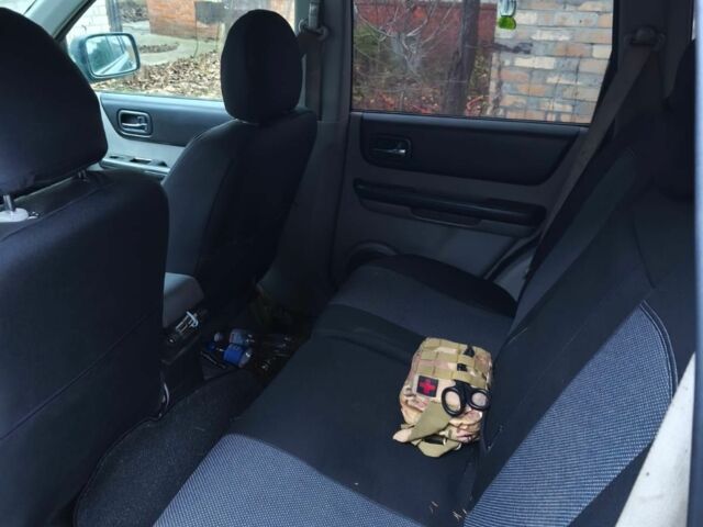 Зеленый Ниссан ИксТрейл, объемом двигателя 2.2 л и пробегом 406 тыс. км за 2135 $, фото 5 на Automoto.ua