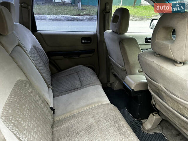 Зеленый Ниссан ИксТрейл, объемом двигателя 2 л и пробегом 308 тыс. км за 5700 $, фото 12 на Automoto.ua