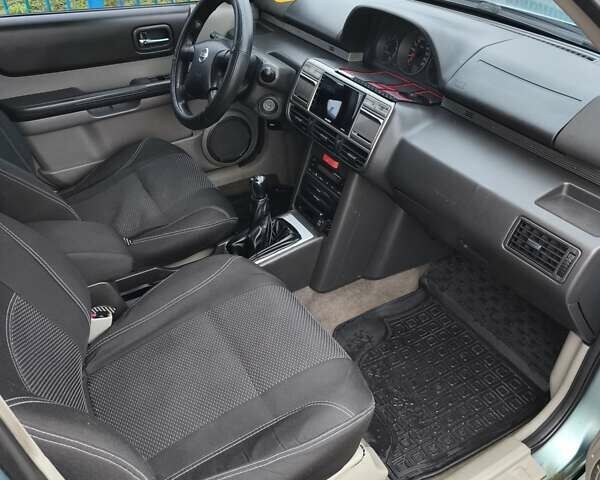 Зелений Ніссан ІксТрейл, об'ємом двигуна 2.18 л та пробігом 372 тис. км за 6100 $, фото 6 на Automoto.ua