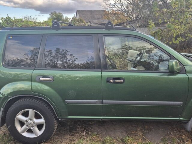 Зеленый Ниссан ИксТрейл, объемом двигателя 2 л и пробегом 334 тыс. км за 3974 $, фото 5 на Automoto.ua