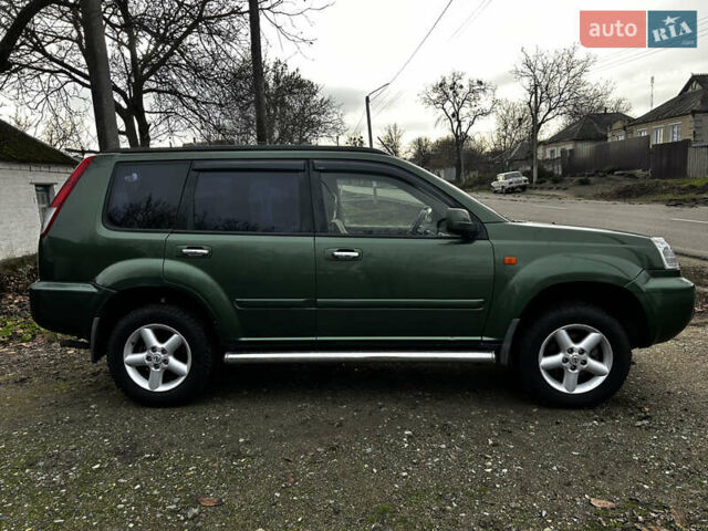 Зеленый Ниссан ИксТрейл, объемом двигателя 2 л и пробегом 308 тыс. км за 5700 $, фото 2 на Automoto.ua