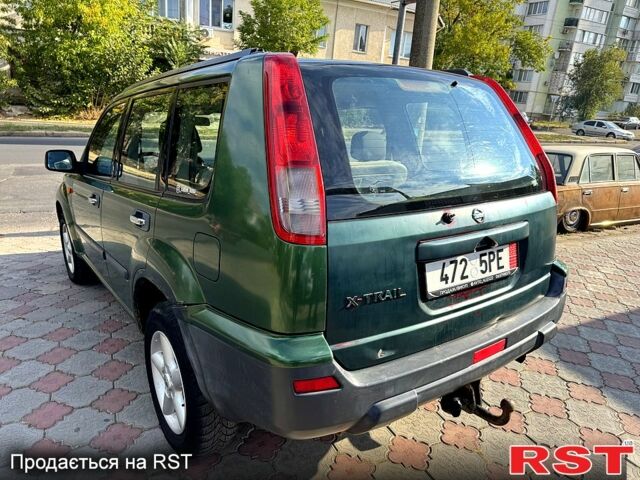 Зеленый Ниссан ИксТрейл, объемом двигателя 2.2 л и пробегом 300 тыс. км за 3199 $, фото 5 на Automoto.ua